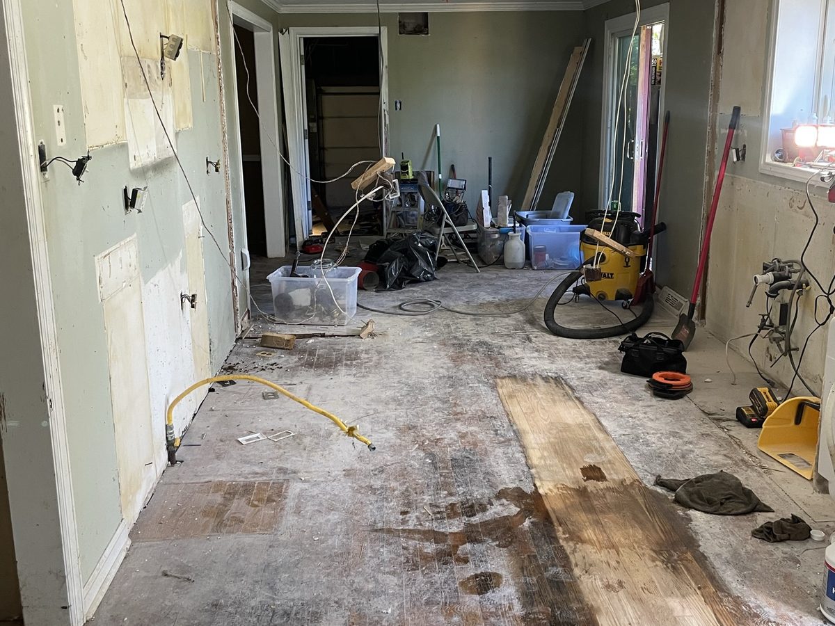Kitchen torn out to the subfloor before the remodel