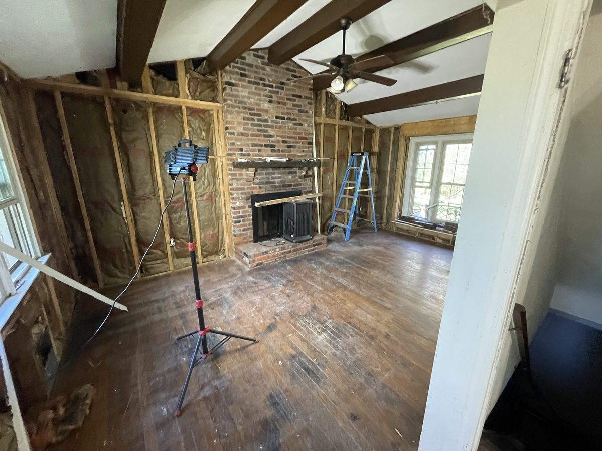 Living room gutted to the studs before the remodel